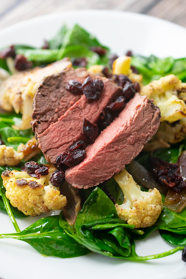 Beef Tenderloin with Roasted Cauliflower and Spinach Salad