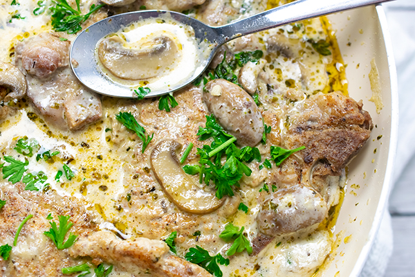 Smothered Pork Chops in Mushroom Sauce