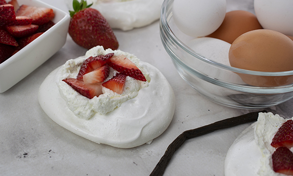 Meringue Nests with Vanilla Bean Whipped Cream and Strawberries