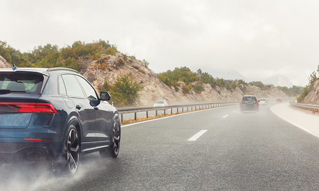 Wet Summer Conditions: As drivers prepare for summer road trips, navigating seasonal weather with worn tires can often be an overlooked safety concern.