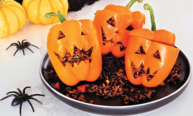 Jack-o'-Lantern Stuffed Peppers Prove Fun Isn't Just for Pumpkins